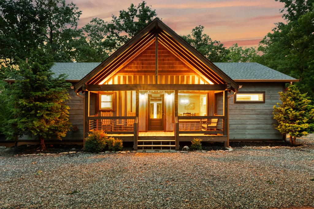 566 High Meadows Drive Morganton, GA 30560 - Photo 3 of 46 a front view of a house with a yard