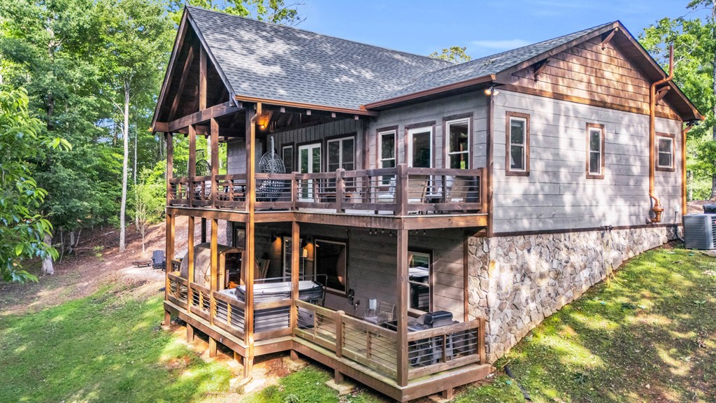 566 High Meadows Drive Morganton, GA 30560 - Photo 40 of 46 a view of house with a chairs in patio