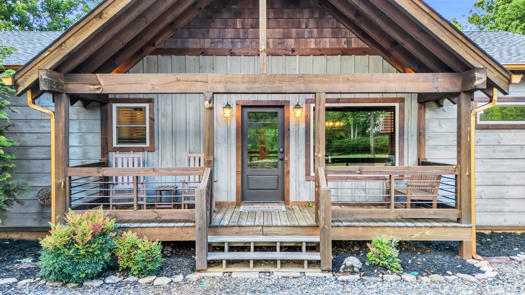 566 High Meadows Drive Morganton, GA 30560 - Photo 7 of 46 a front view of a house with a porch