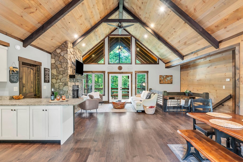 566 High Meadows Drive Morganton, GA 30560 - Photo 8 of 46 a living room with furniture and large windows