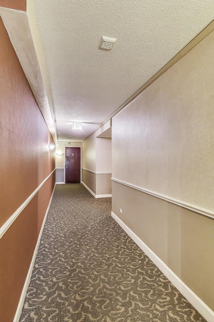 440 North Wabash Avenue, Unit 1605 Chicago, IL 60611 - Photo 11 of 53 a view of hallway with stairs