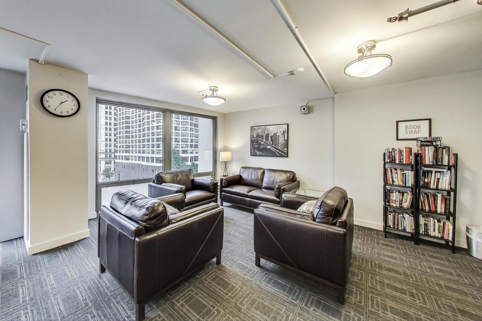 440 North Wabash Avenue, Unit 1605 Chicago, IL 60611 - Photo 43 of 53 a living room with furniture wooden floor and window
