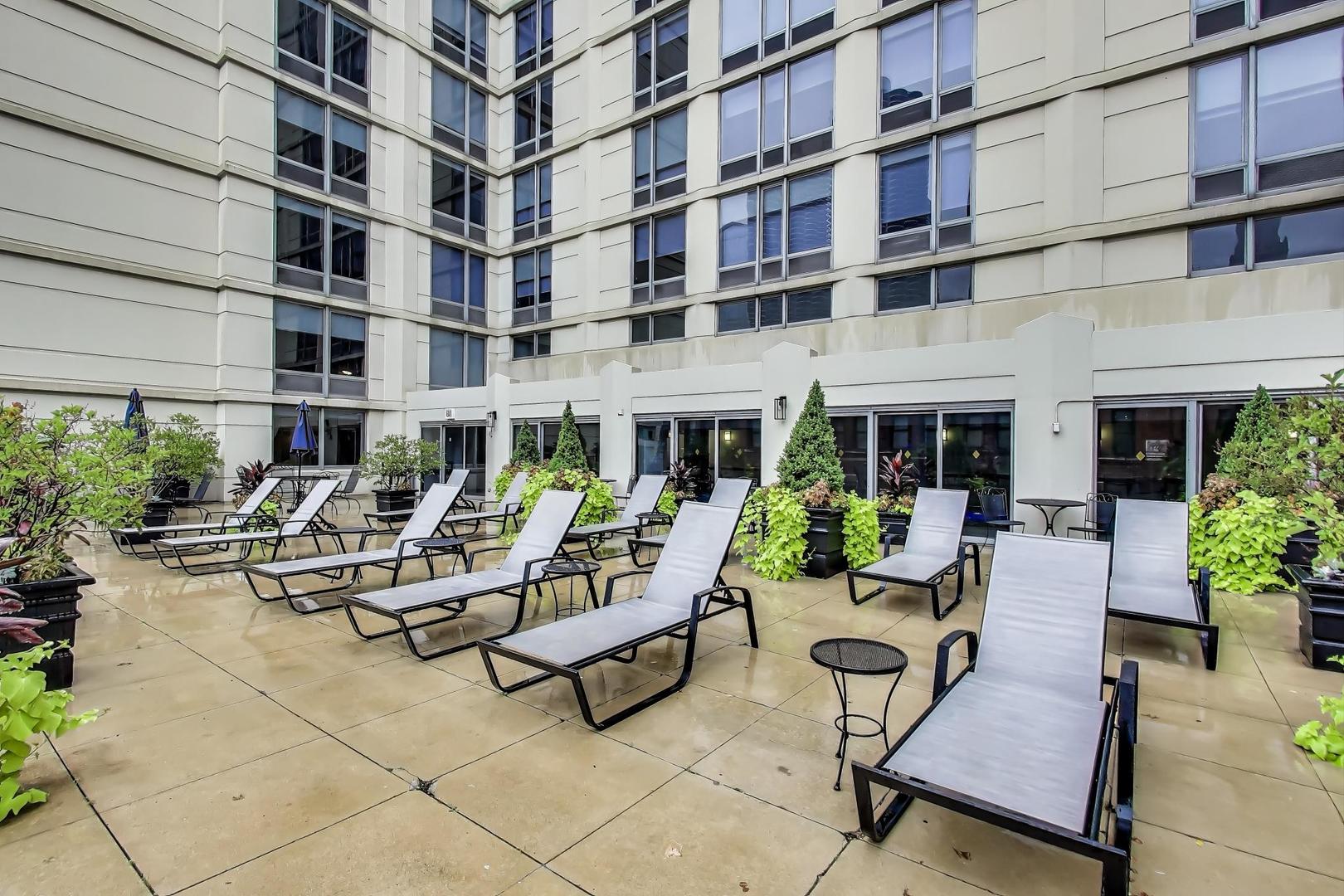 440 North Wabash Avenue, Unit 1605 Chicago, IL 60611 - Photo 50 of 53 a view of a building with outdoor seating