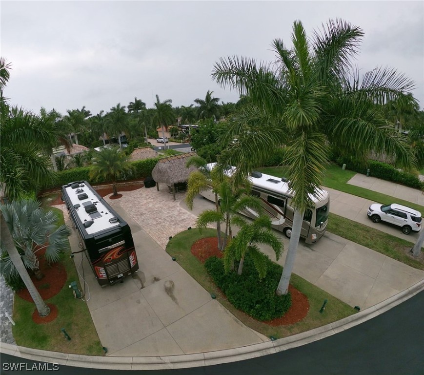 13530 Snook Circle Naples, FL 34114 - Photo 13 of 20 an aerial view of a house with garden space and street view