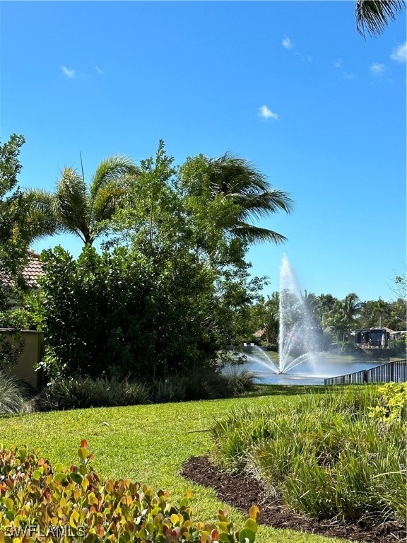 13530 Snook Circle Naples, FL 34114 - Photo 15 of 20 a view of a garden with a house
