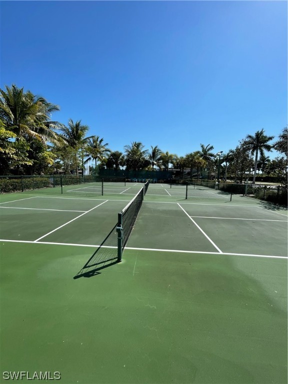 13530 Snook Circle Naples, FL 34114 - Photo 18 of 20 a view of a tennis court