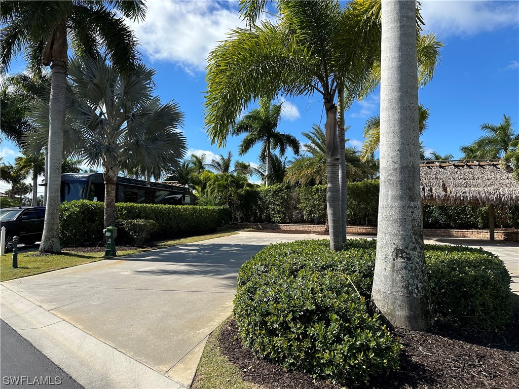 13530 Snook Circle Naples, FL 34114 - Photo 5 of 20 a view of a park with palm trees