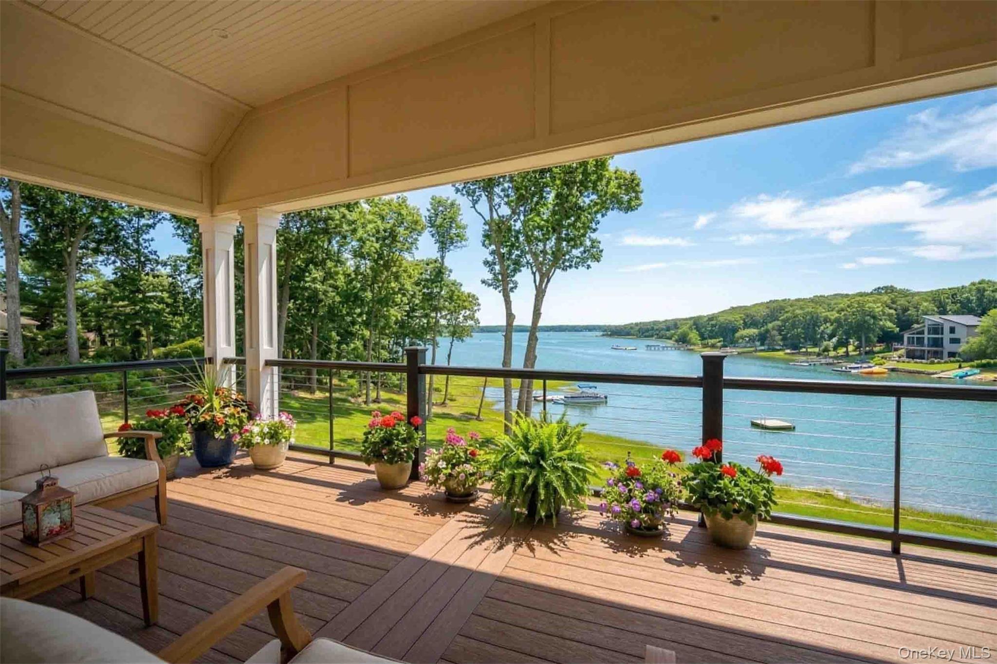 106 Cove Road Asharoken, NY 11768 - Photo 23 of 46 Wooden terrace with a water view