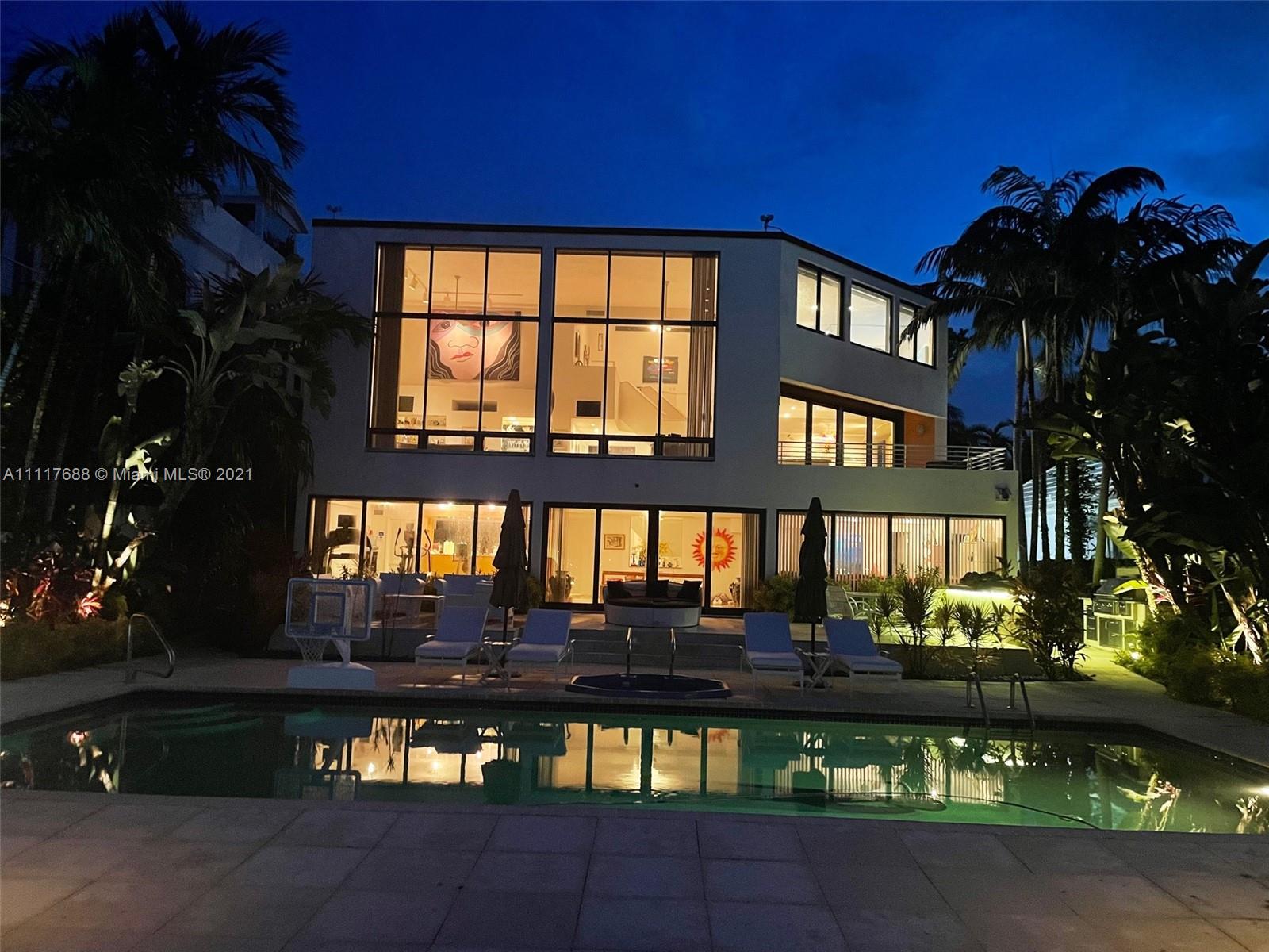 279 North Hibiscus Drive Miami Beach, FL 33139 - Photo 1 of 21 a front view of a house with a yard