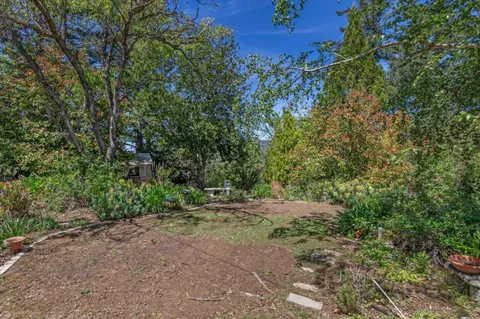 a view of backyard with outdoor space