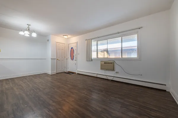a view of kitchen with wooden floor