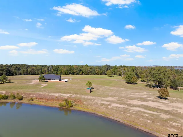 a view of a lake with outdoor space