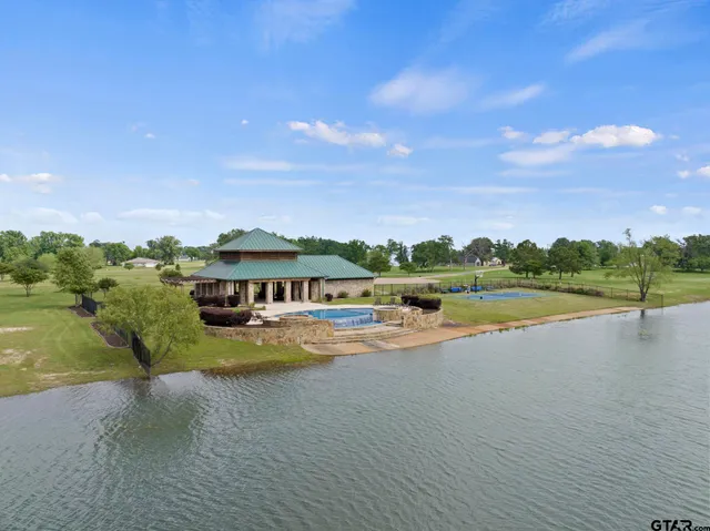 a view of a house with a big yard