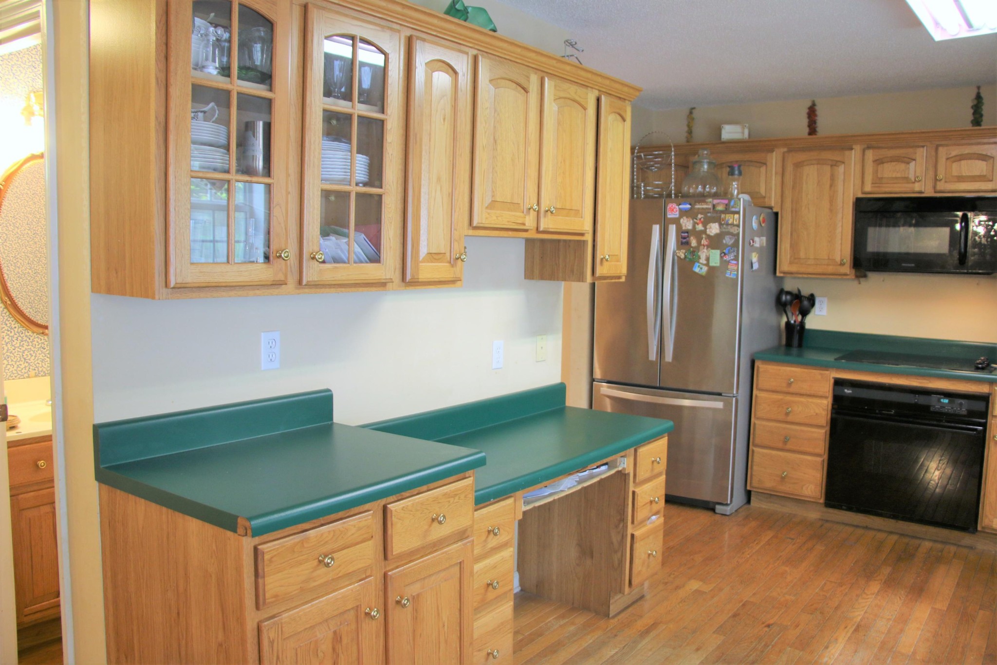 100 Nathan Lane Oak Ridge, TN 37830 - Photo 16 of 20 a kitchen with stainless steel appliances granite countertop a stove and a refrigerator