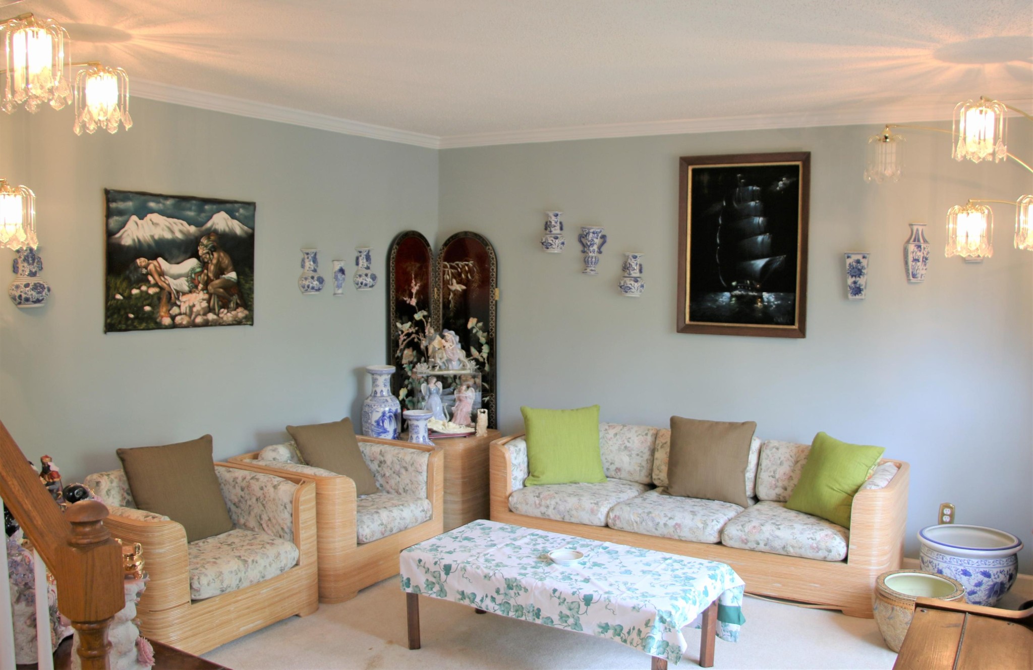100 Nathan Lane Oak Ridge, TN 37830 - Photo 8 of 20 a living room with furniture a couch and paintings on the wall