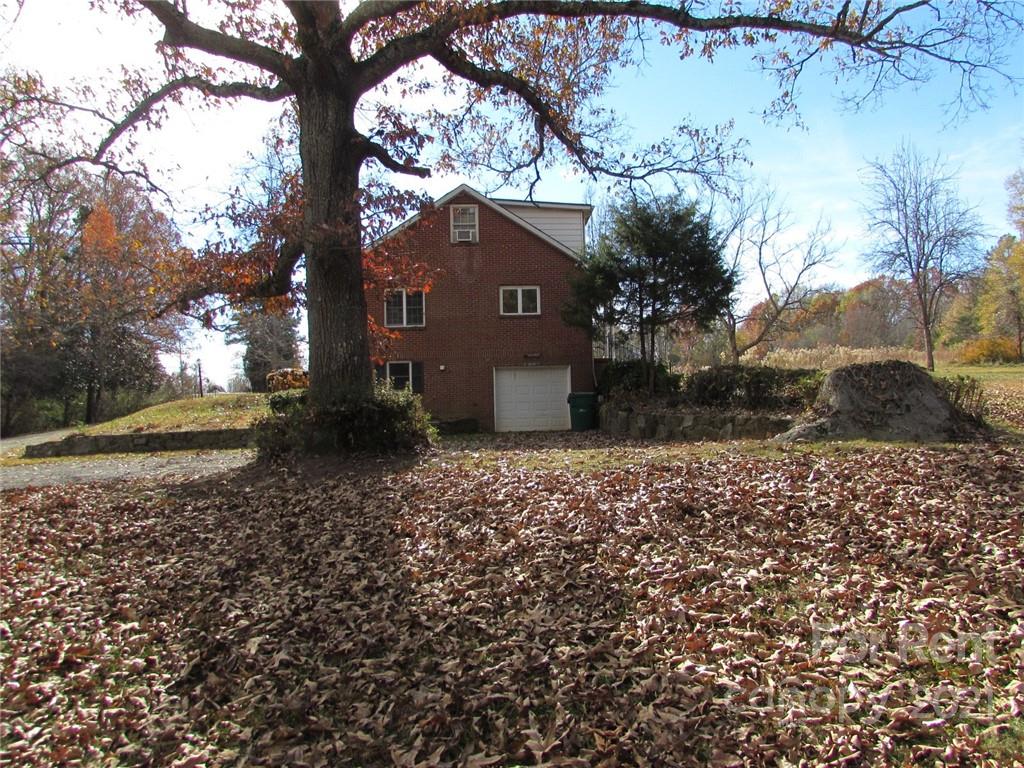 14315 Ramah Church Road Huntersville, NC 28078 - Photo 2 of 32 a view of a house with a yard