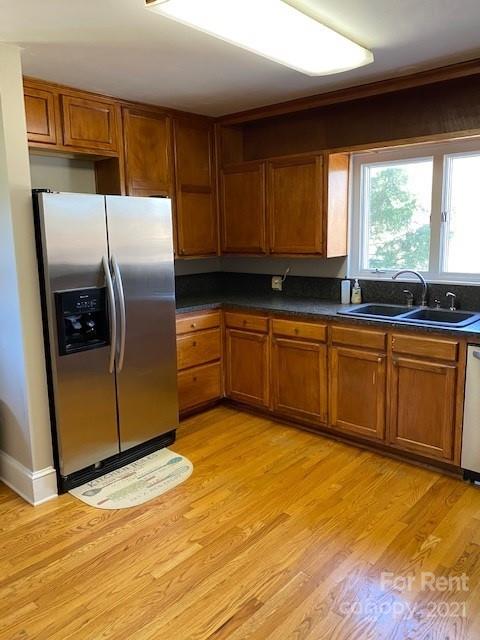 14315 Ramah Church Road Huntersville, NC 28078 - Photo 11 of 32 a kitchen with stainless steel appliances granite countertop a sink a stove and a refrigerator