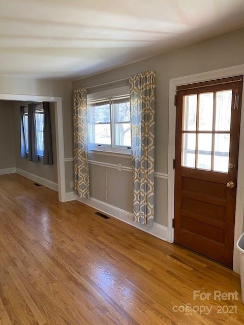 14315 Ramah Church Road Huntersville, NC 28078 - Photo 14 of 32 wooden floor in an empty room with a window