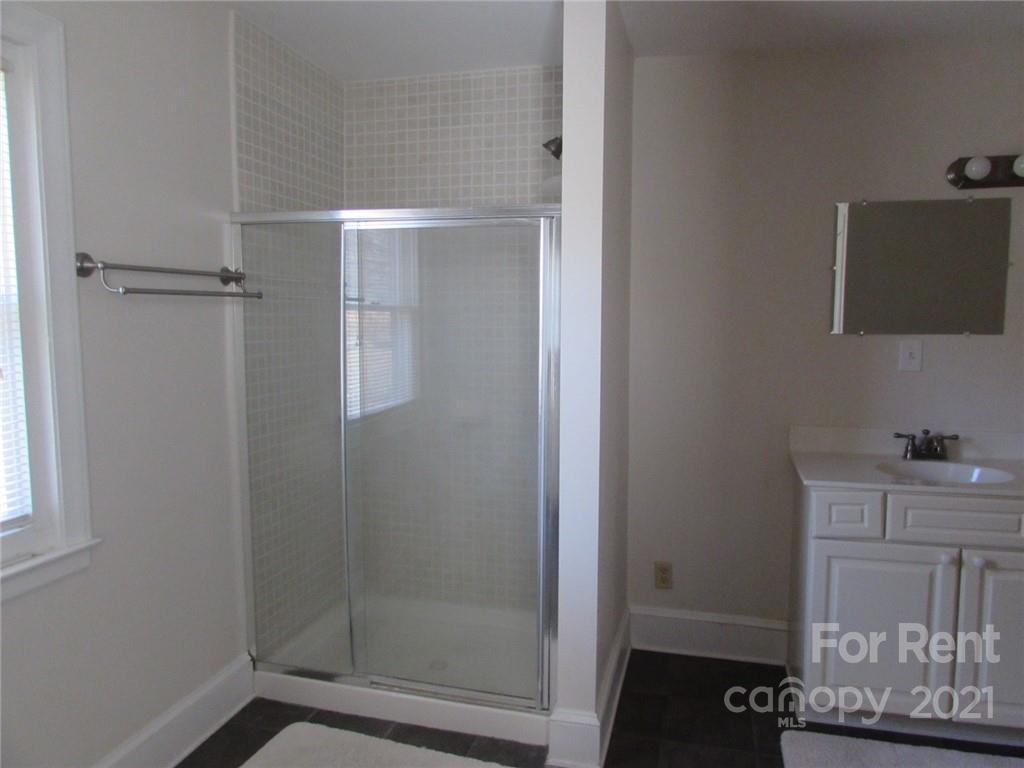 14315 Ramah Church Road Huntersville, NC 28078 - Photo 24 of 32 a bathroom with a shower