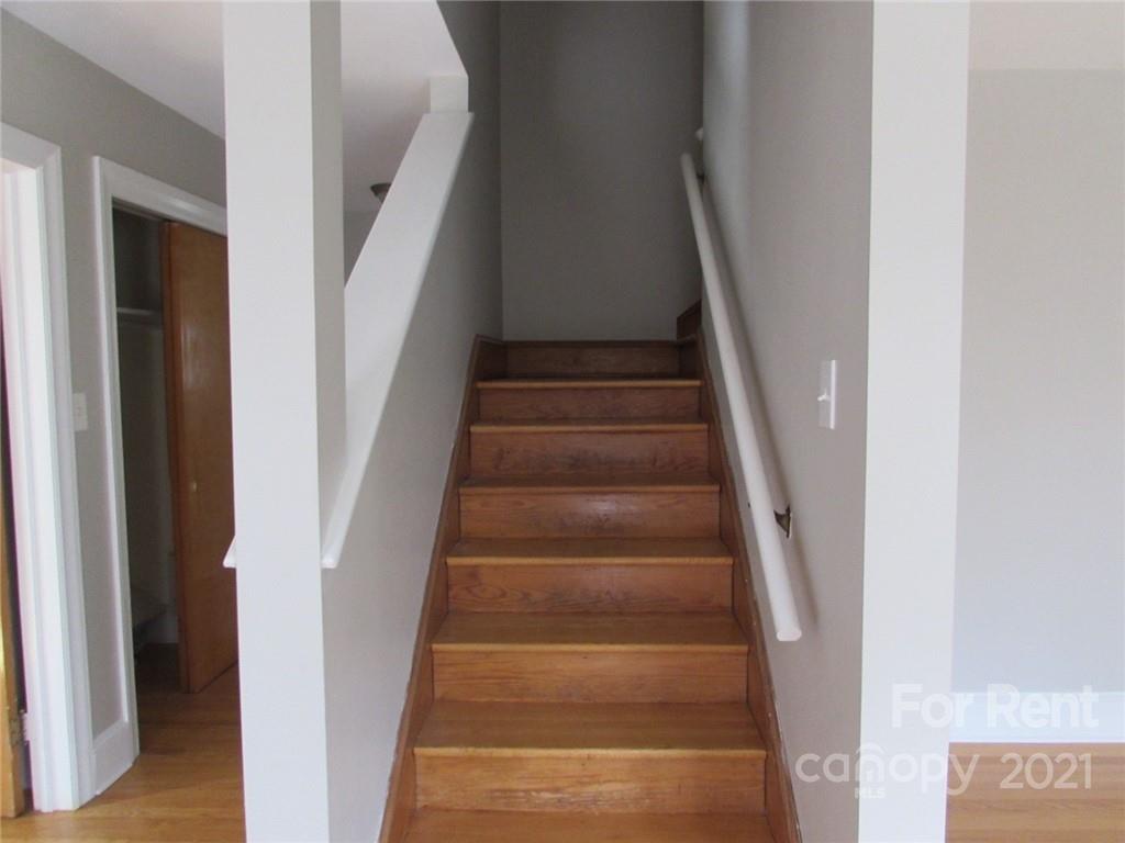 14315 Ramah Church Road Huntersville, NC 28078 - Photo 25 of 32 a view of staircase with white walls and white walls