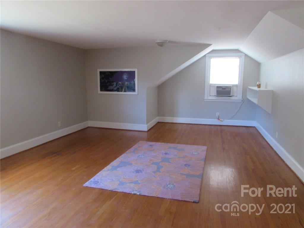 14315 Ramah Church Road Huntersville, NC 28078 - Photo 27 of 32 a view of a hallway with wooden floor