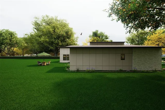 a view of a back yard of the house
