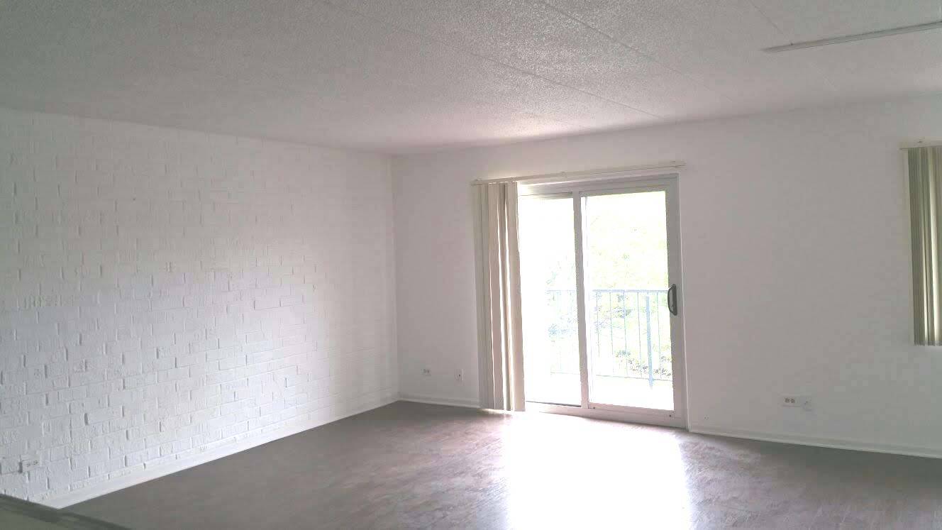 3220 Sanders Road, Unit 3B Northbrook, IL 60062 - Photo 2 of 11 an empty room with window