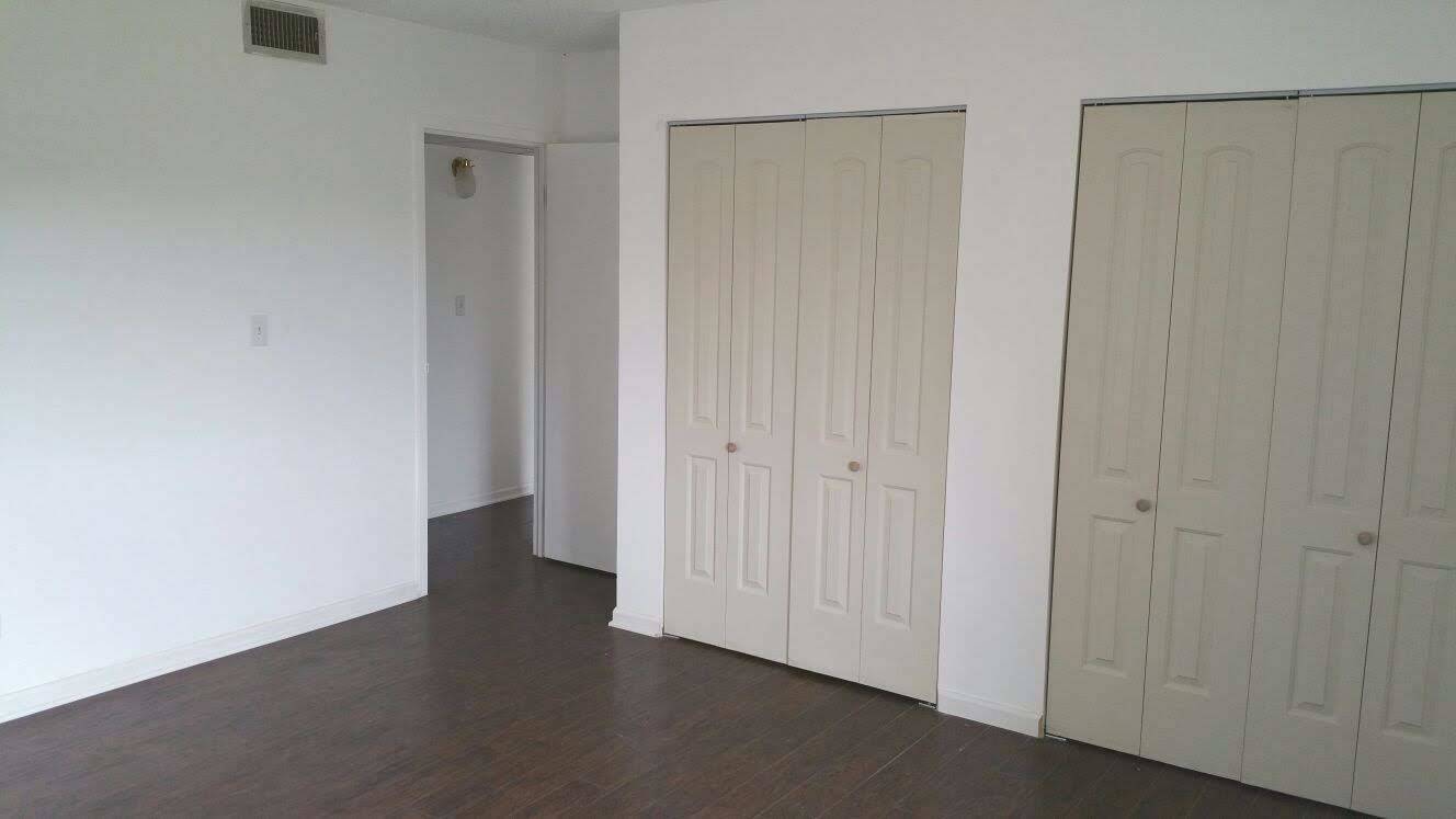 3220 Sanders Road, Unit 3B Northbrook, IL 60062 - Photo 5 of 11 a view of a hallway with closet area