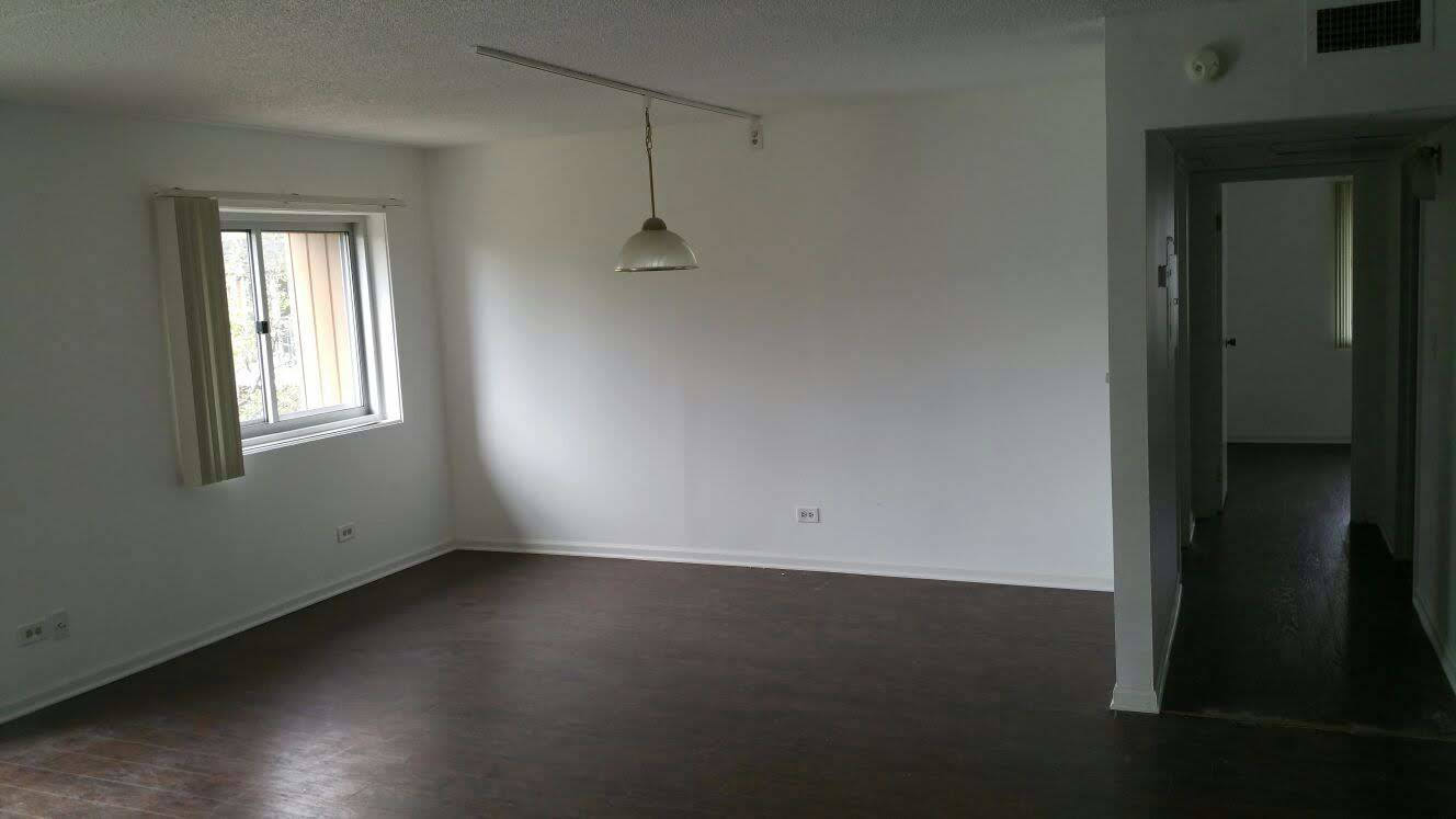 3220 Sanders Road, Unit 3B Northbrook, IL 60062 - Photo 10 of 11 an empty room with a window