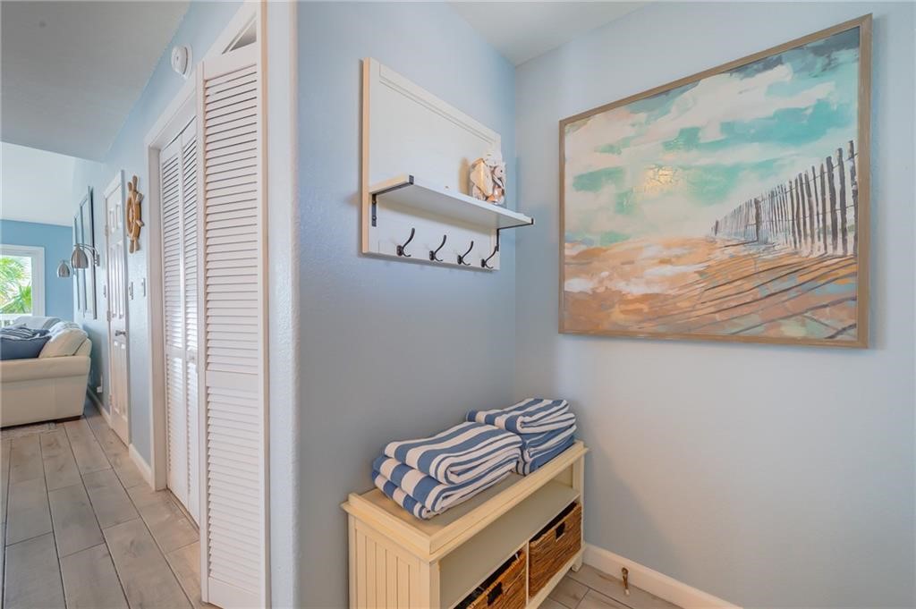 2292 North Fulton Beach Road, Unit 405 Rockport, TX 78382 - Photo 19 of 40 a view of an entryway with wooden floor
