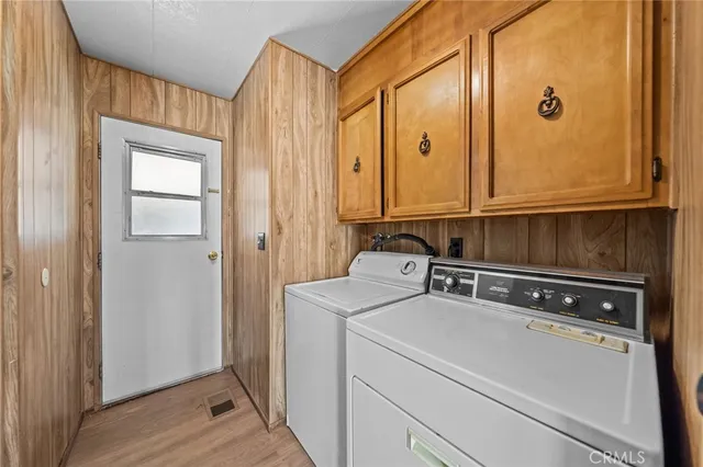 a building with car parked in front of it