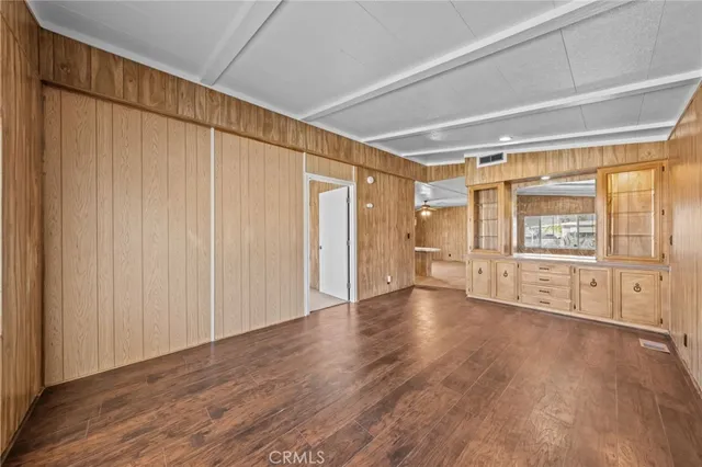 a kitchen with stainless steel appliances granite countertop a stove and a microwave