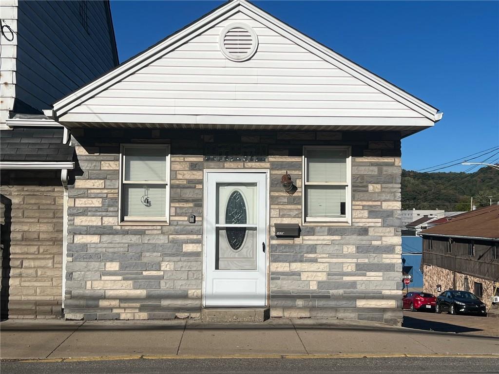 1039 State Avenue, Unit 1039 Coraopolis, PA 15108 - Photo 1 of 6 a view of a white house