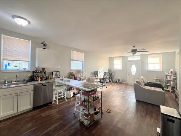 a view of a kitchen and dining room
