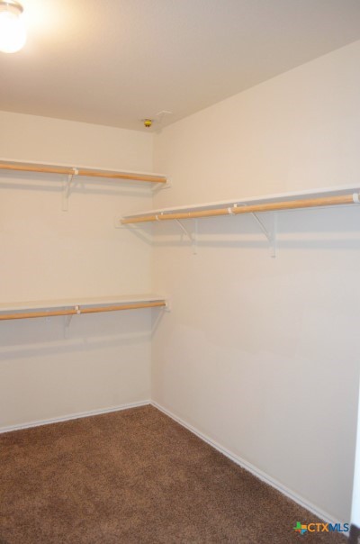 4808 Green Meadow Street Killeen, TX 76549 - Photo 34 of 46 a view of small space with racks on the wall