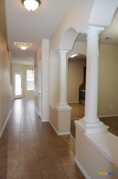 4808 Green Meadow Street Killeen, TX 76549 - Photo 5 of 46 a bathroom with a sink a toilet and mirror