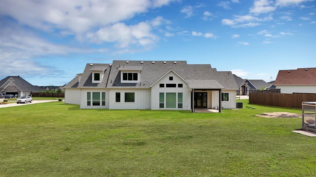 2223 Providence Way Nevada, TX 75173 - Photo 6 of 40 a front view of a house with a garden