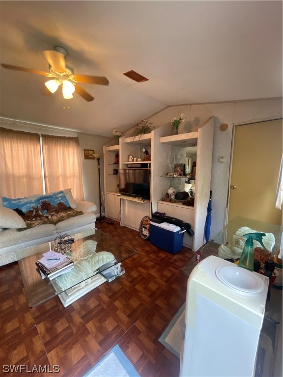 5320 8th Street Clewiston, FL 33440 - Photo 5 of 18 a living room with furniture and a flat screen tv