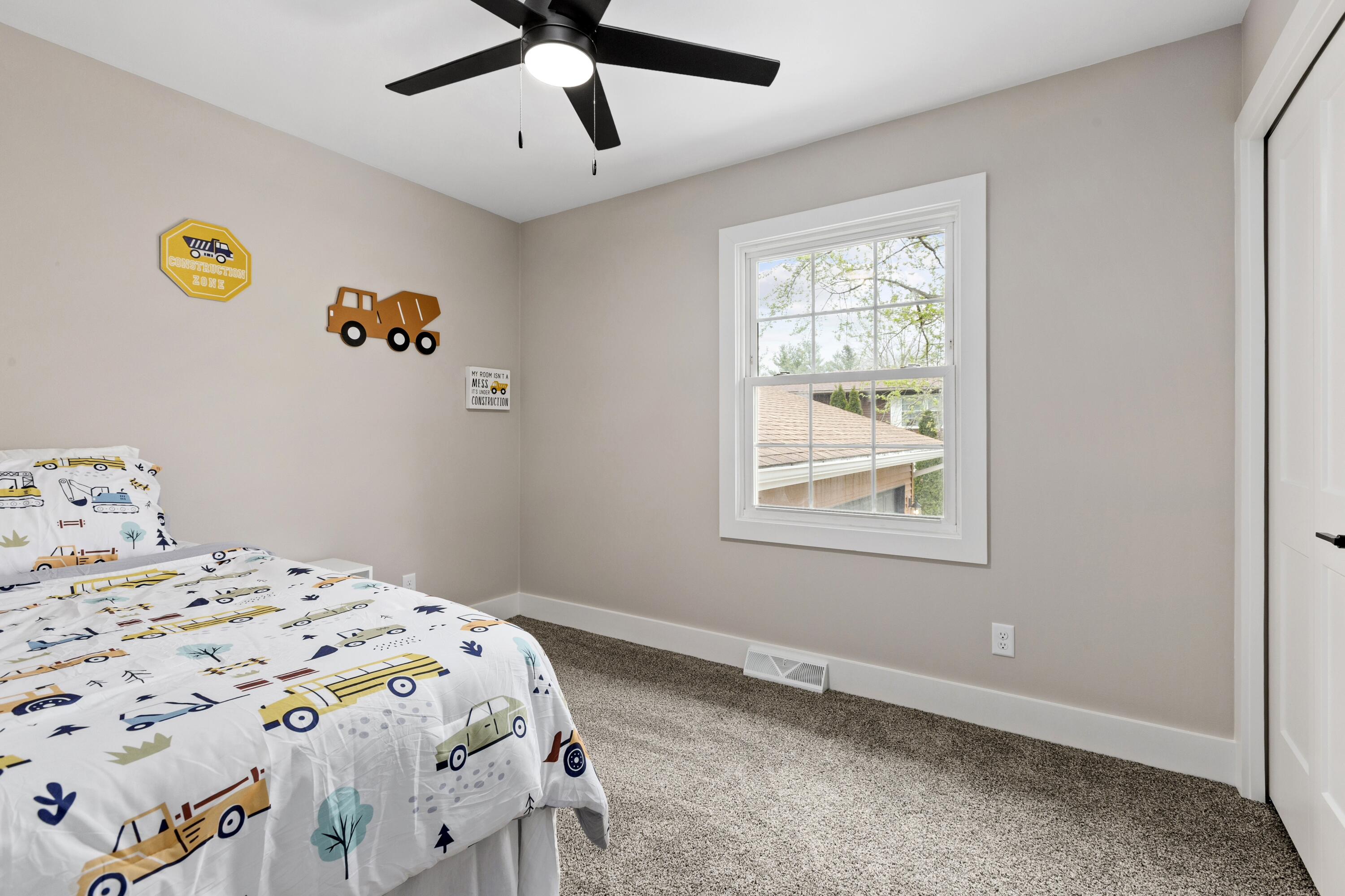263 West 550 North Valparaiso, IN 46385 - Photo 11 of 23 a bedroom with a bed and a window