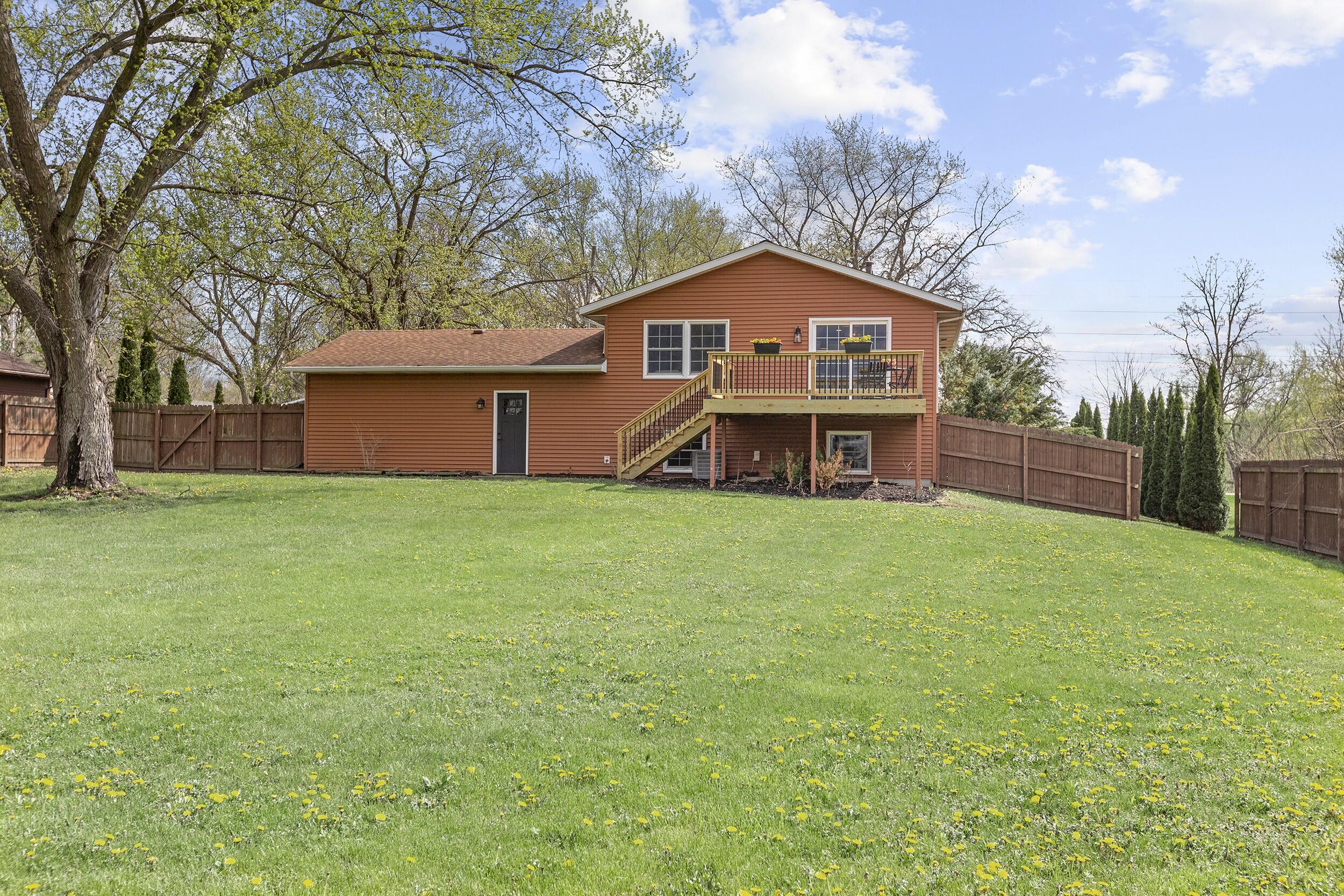 263 West 550 North Valparaiso, IN 46385 - Photo 22 of 23 a front view of a house with a yard and trees