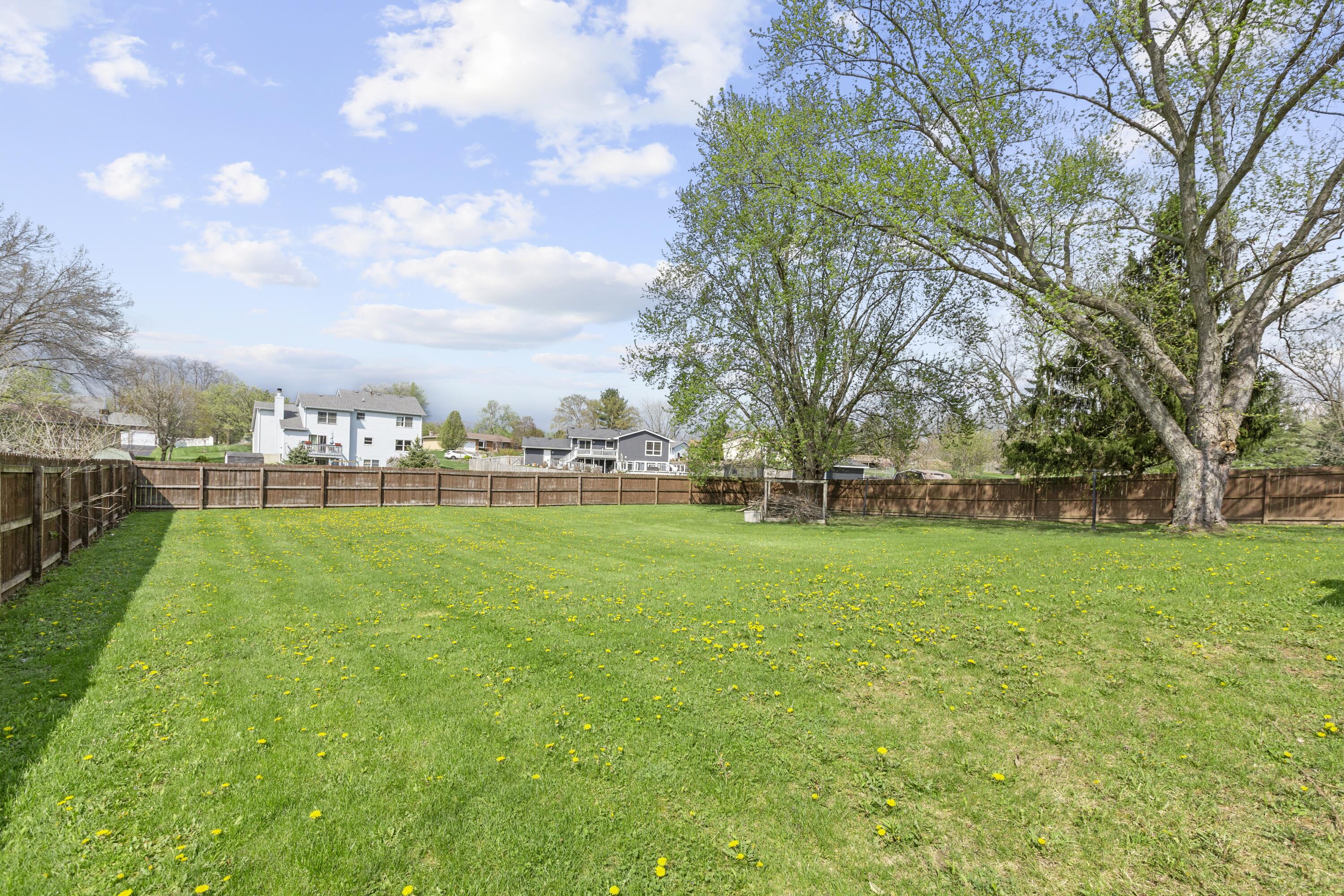 263 West 550 North Valparaiso, IN 46385 - Photo 23 of 23 a view of a field of grass and trees