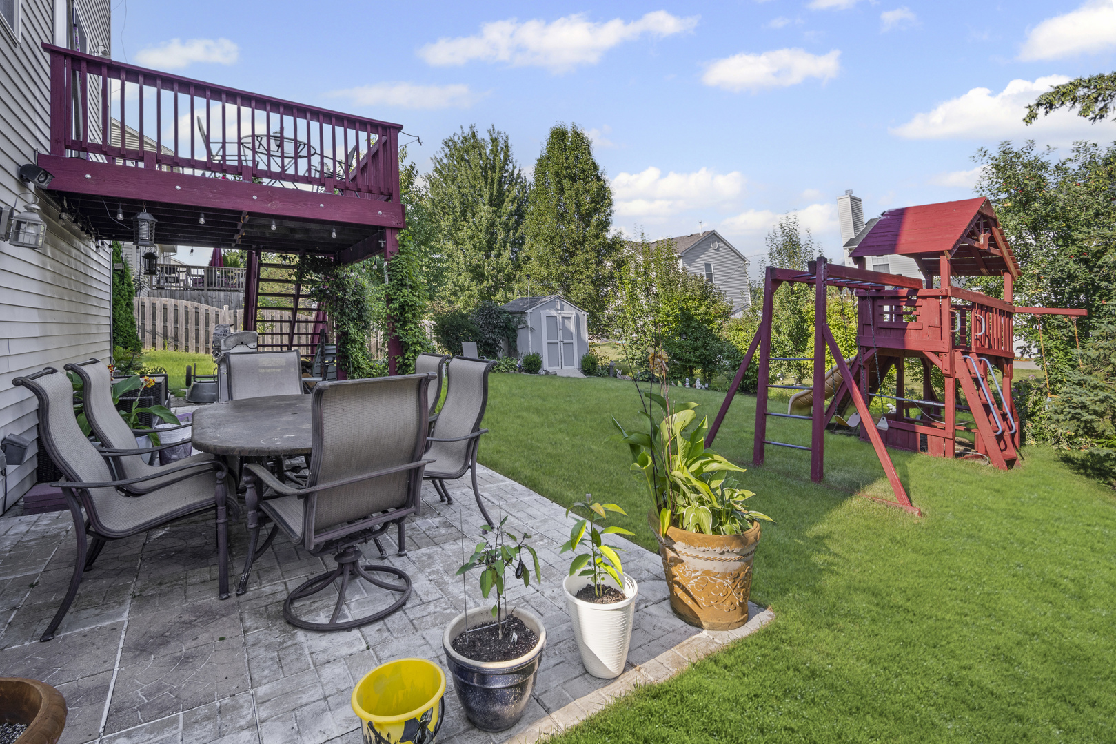 345 Kestrel Lane Lindenhurst, IL 60046 - Photo 19 of 24 a view of a patio with furniture and a backyard