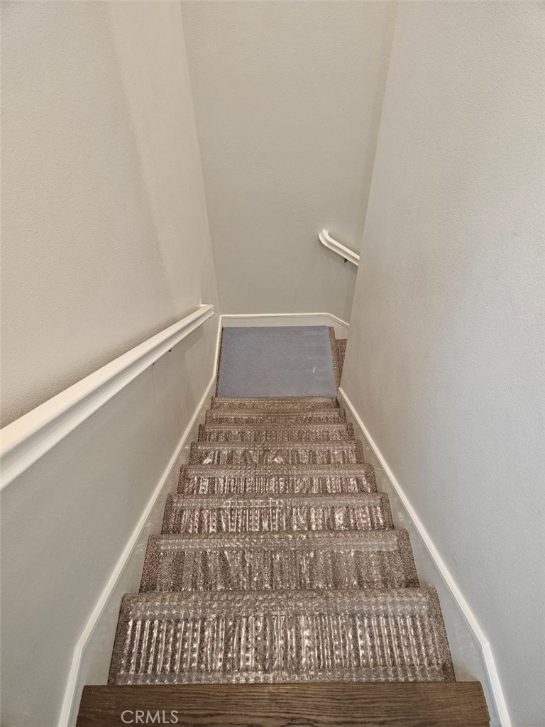 35 Courant Irvine, CA 92618 - Photo 12 of 37 a view of staircase with white walls