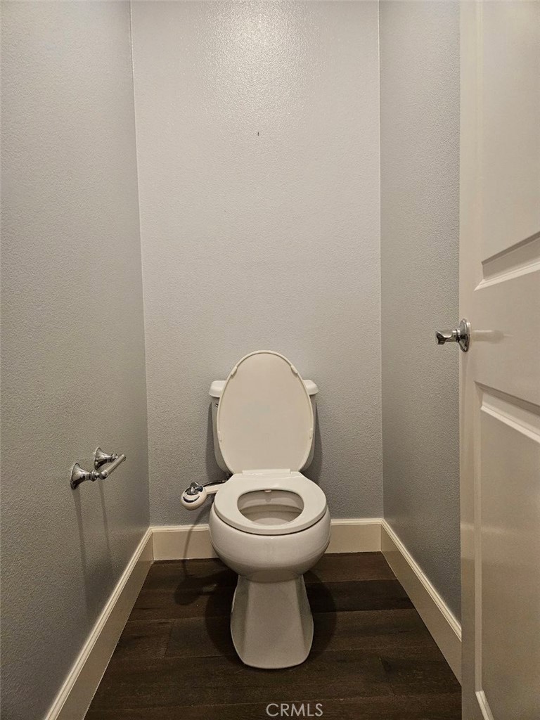 35 Courant Irvine, CA 92618 - Photo 21 of 37 a white toilet sitting in a bathroom