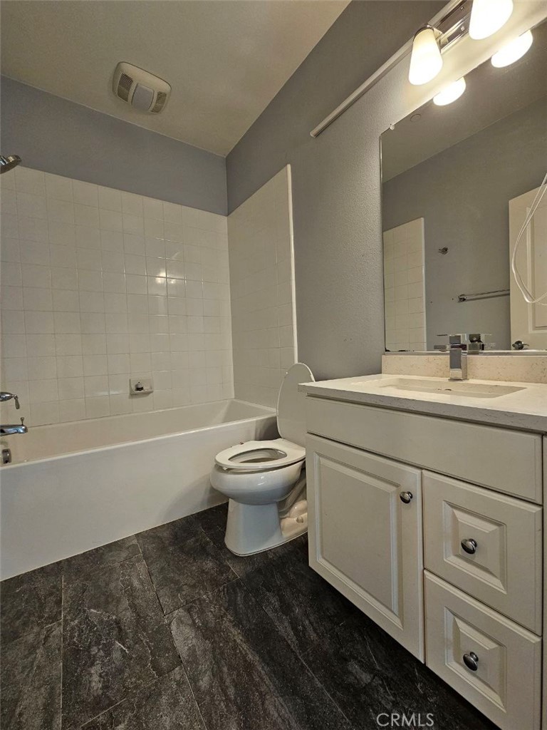 35 Courant Irvine, CA 92618 - Photo 26 of 37 a bathroom with a sink toilet and shower