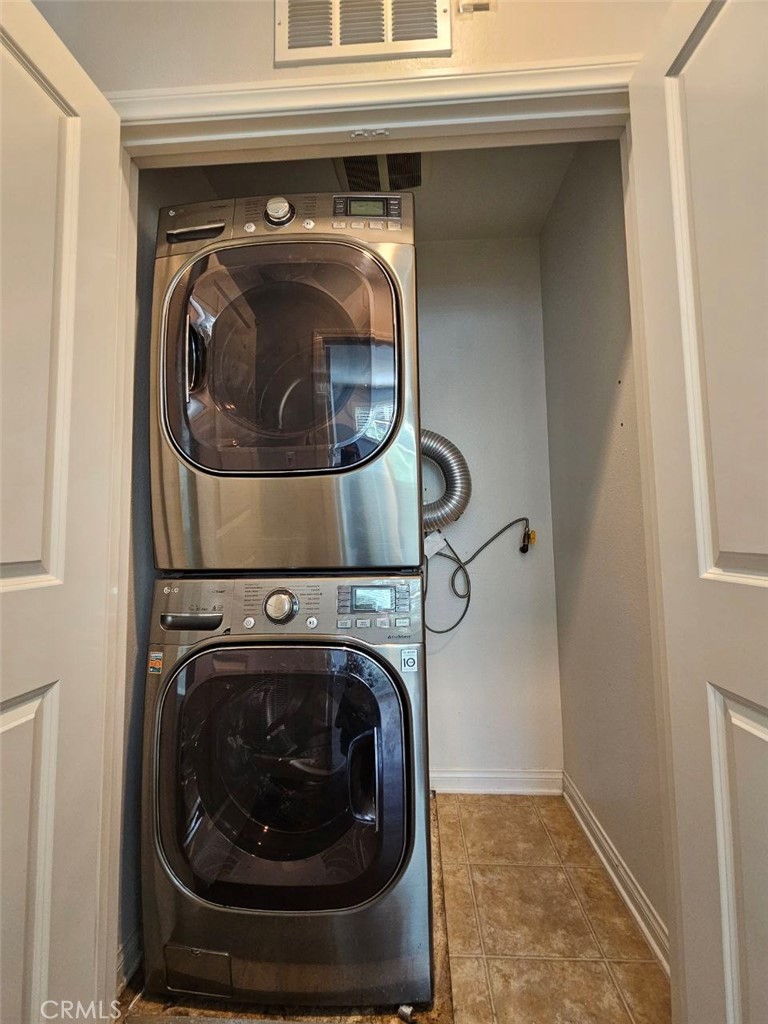 35 Courant Irvine, CA 92618 - Photo 30 of 37 a utility room with dryer and washer