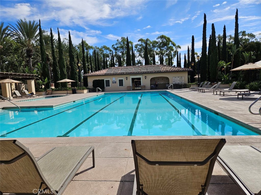 35 Courant Irvine, CA 92618 - Photo 33 of 37 a view of a patio with swimming pool