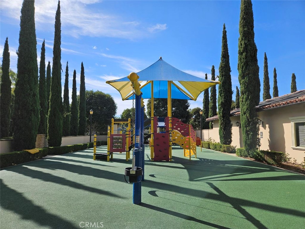 35 Courant Irvine, CA 92618 - Photo 36 of 37 a view of a park with swings on a table