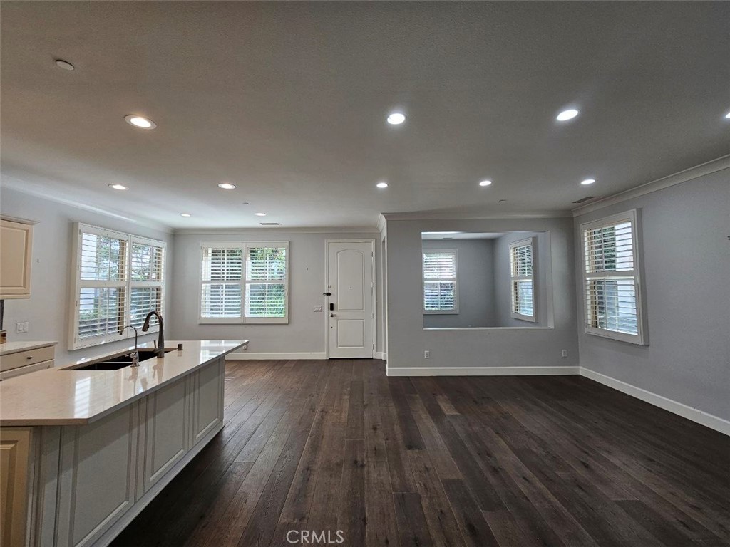 35 Courant Irvine, CA 92618 - Photo 4 of 37 a view of an empty room with wooden floor and a window
