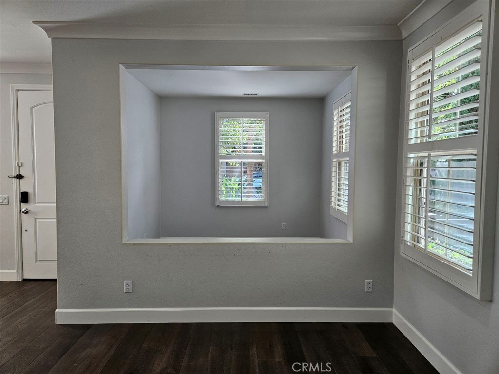 35 Courant Irvine, CA 92618 - Photo 6 of 37 a view of an empty room with wooden floor and a window